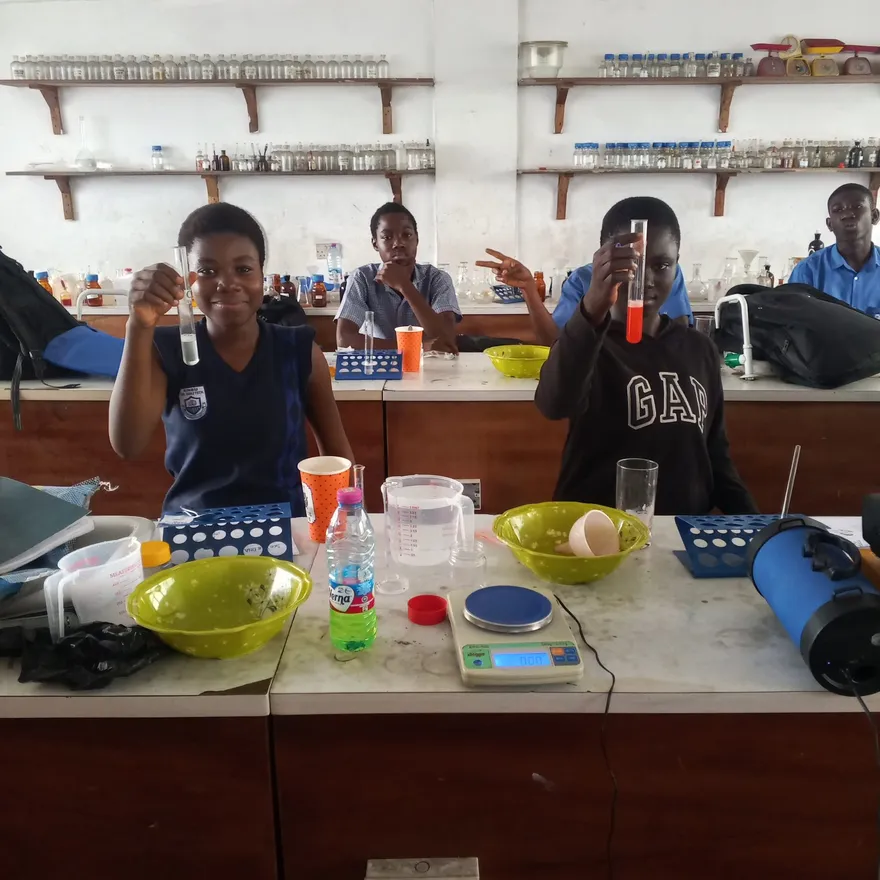 Sankofa STEM fellows at laboratory benches during the 2025 fellowship in Accra